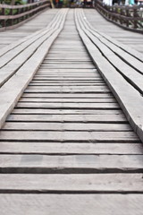 The old wooden bridge Bridge collapse Bridge across the river (Mon bridge )at sangklaburi Thailand