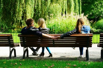 Love triangle in Vilnius town Bernardinu garden on autumn
