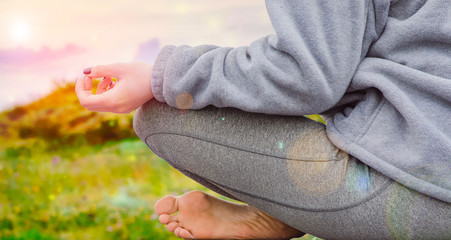 beautifull young woman doing yoga in the sunrise