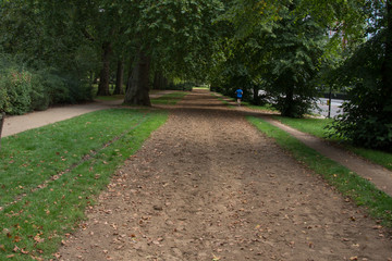 Man jogging in Hyde Park in London