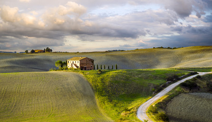 country road leading to an agriturismo in Tuscany