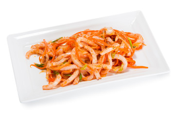 Salad of boiled squid and carrots and spices