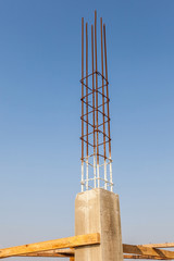 Foundation construction with clear blue sky background.