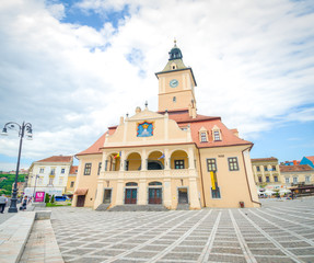 BRASOV, ROMANIA - 29 JUNE 2015: Brasov old medieval romanesque Town Hall or Council House in Sfatului Square or Council Square in the center of the city in Transylvania region of Romania