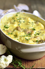 Baked cauliflower with mushrooms.