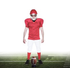 Obraz premium Serious American football player looking at camera