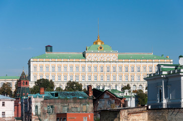 Naklejka premium Grand Kremlin Palace on the background of old ruined houses. 