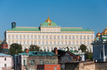 Naklejka premium Grand Kremlin Palace on the background of old ruined houses. 
