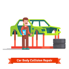 Collision repair center specialist checking car