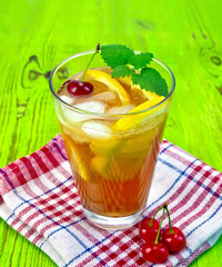 Lemonade with cherry on green board