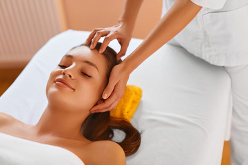 Fototapeta na wymiar Face skin. Woman receiving facial spa treatment, massage.