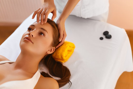 Face spa. Woman during facial massage. Face treatment, skin care