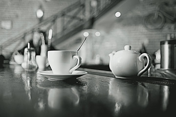cup of tea at a cafe blurred background