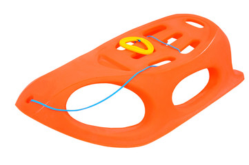Plastic sled on white background