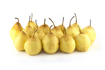 Heap of ripe china pears isolated on white closeup