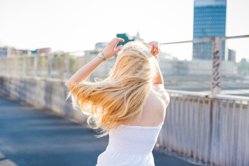 young handsome caucasian long blonde straight hair woman dancing