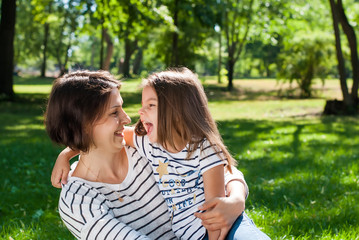 Naklejka premium Happy Mother and Daughter have Fun