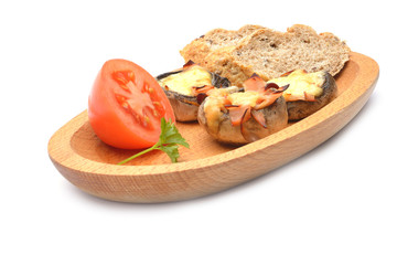 Baked mushrooms with tomatoes and bread