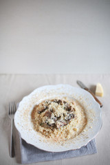 Wild mushroom risotto rice with grated parmesan cheese