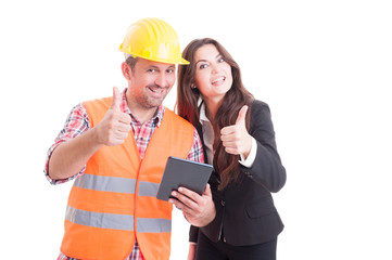 Construction builder and business woman standing back to back