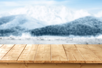 wooden table place and snow 