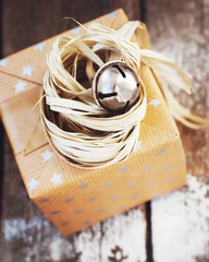 Christmas Box with Jingle Hand Bell and Natural Twine. Toned