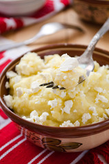 Traditional Ukrainian millet-porridge with butter and cheese