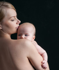 Mother and baby. Happy family. Mom's love and tenderness.