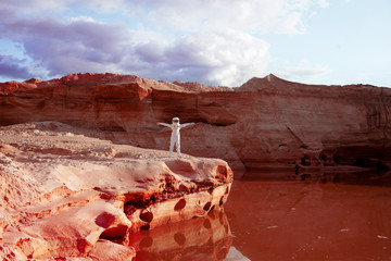 happy futuristic astronaut on another planet, image with the