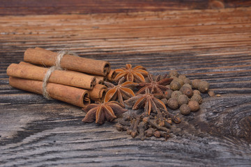 Spices lying on a wooden surface