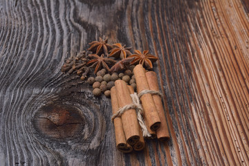 Spices lying on a wooden surface