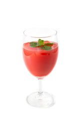 Tomato vegetable juice in glass isolated on white background