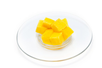 mango slice in plate isolated on white background