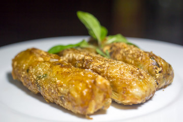 Nem - homemade spring rolls with chili sauce and fresh coriander - vietnamese cuisine