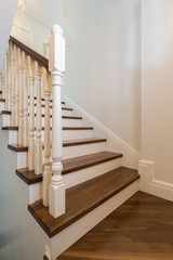 Wooden stairs with railing