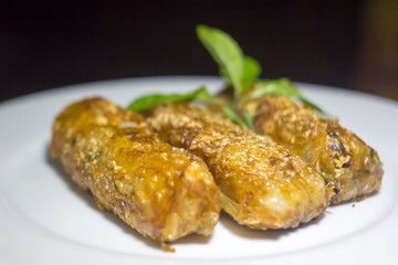 Nem - homemade spring rolls with chili sauce and fresh coriander - vietnamese cuisine
