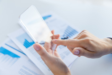 close up of woman with transparent smartphone