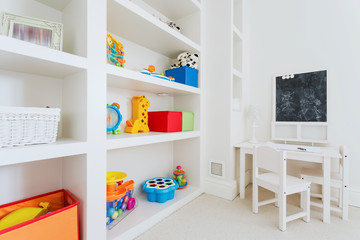 White furnitures in child room