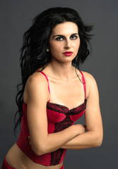 Naklejka premium attractive young woman in red lingerie