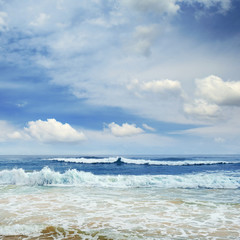 Ocean waves and blue sky