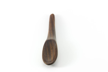 Wooden ladle on white background