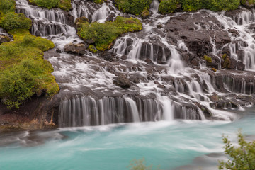 Fototapeta na wymiar Hraunfossar Waterfalls