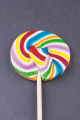 Lollipop various colors on black background