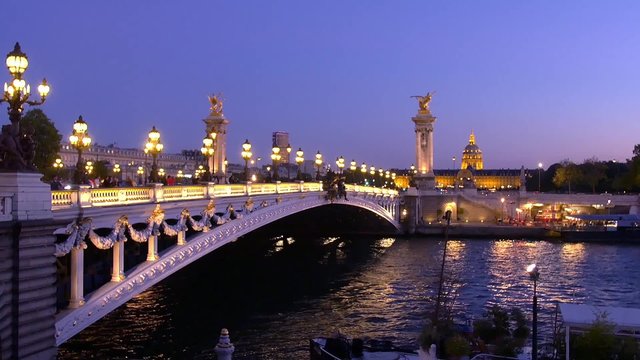 Paris, France, Alexandre iii bridge and hotel des Invalides illuminated at night