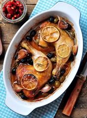 roast chicken legs with onion, olives, garlic, lemon and rosemary