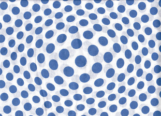 abstract texture with blue dots on white.