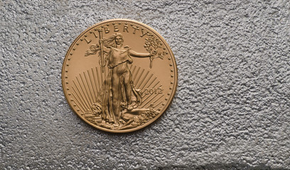American Gold Eagle Coin on Silver Bar