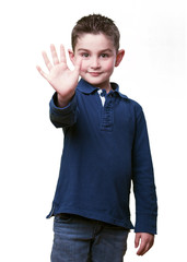 Naklejka premium little kid showing 5 fingers