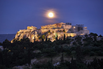 Athens Greece, acropolis illuminated under full moon