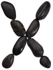 Alphabet from stones. Letter X